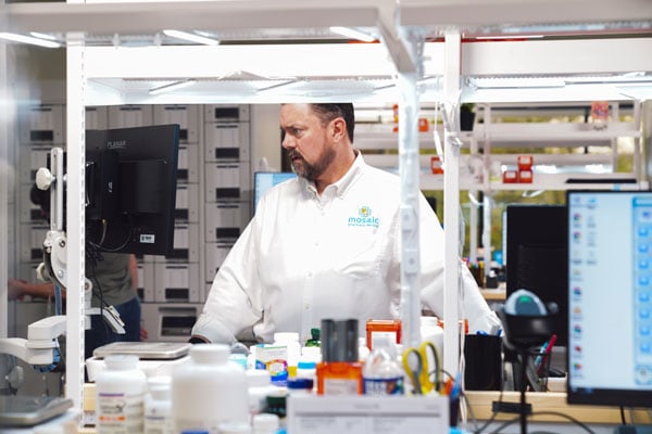 Pharmacist reviewing prescription